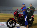 Nasir Hossain gives Umar Akmal a ride on the bike he won as Bangladesh's best player of the series, Bangladesh v Pakistan, 3rd ODI, Chittagong, December 6, 2011 