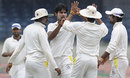 Tamil Nadu's J Kaushik celebrates a wicket, Tamil Nadu v Madhya Pradesh, Ranji Trophy Elite, Chennai, 3rd day, December 23, 2011