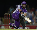 Travis Birt plays a paddle-sweep during his whirlwind 74, Brisbane Heat v Hobart Hurricanes, BBL 2011-12, Brisbane, January 6, 2012