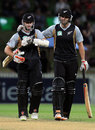 Kane Williamson and Andrew Ellis walk off after a successful chase, New Zealand v Zimbabwe, 2nd Twenty20 international, Hamilton, February 14, 2012 