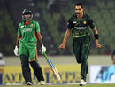 Umar Gul celebrates Nasir Hossain's wicket as Shakib Al Hasan watches, Bangladesh v Pakistan, Asia Cup, Mirpur, March 11, 2012