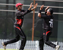 Nizakat Khan and Munir Dar celebrate a wicket for Hong Kong, Hong Kong v Nepal, ICC World Twenty20 qualifier, March 13, 2012