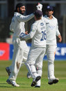 Monty Panesar high fives Sussex wicketkeeper Ben Brown, Lancashire v Sussex, County Championship, Division One, Aigburth, April 12, 2012