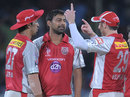 David Hussey talks to Praveen Kumar and Azhar Mahmood, Deccan Chargers v Kings XI Punjab, IPL, Hyderabad, May 8, 2012