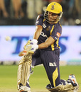 Shakib Al Hasan goes for the slog-sweep, Pune Warriors v Kolkata Knight Riders, IPL, Pune, May 19, 2012