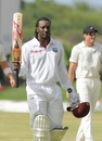 Chris Gayle walks off after steering West Indies to a nine-wicket win, West Indies v New Zealand, 1st Test, Antigua, 5th day, July 29, 2012