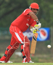 Singapore's Munish Arora plays the ball, Malaysia v Singapore, ICC World Cricket League Division Four 2012, Kuala Lumpur, September 4, 2012
