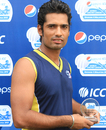 Nepal's Amrit Bhattarai with the man-of-the-match award, Nepal v Singapore, ICC World Cricket League Division Four 2012, Kuala Lumpur, September 3, 2012