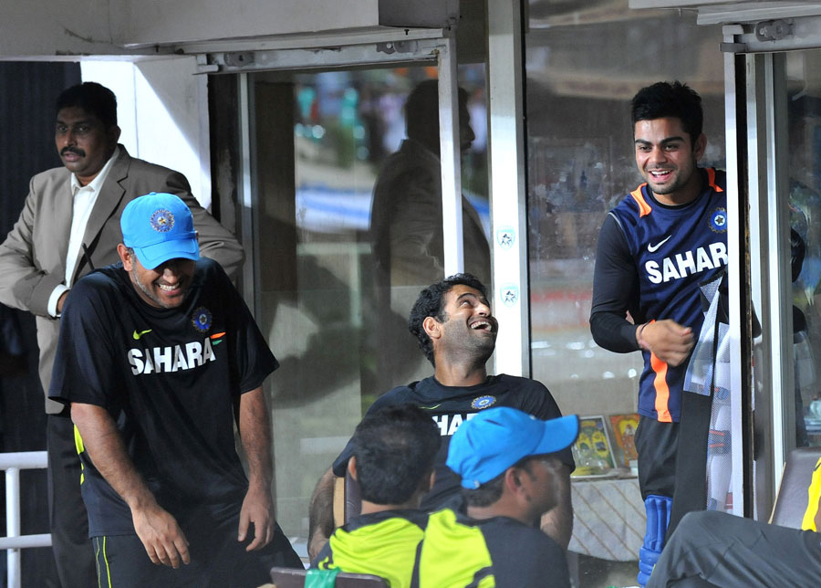 MS Dhoni, Irfan Pathan and Virat Kohli share a joke, India v New Zealand, 1st T20I, Visakhapatnam, September 8, 2012 ©AFP