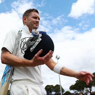 Michael Clarke walks back after batting in a Sydney Grade cricket match
