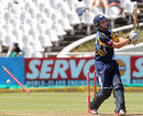 Joe Root's off stump is sent cartwheeling by Moises Henriques, Sydney Sixers v Yorkshire, Group B, Champions League Twenty20, Cape Town, October 16, 2012