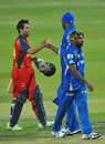 Neil McKenzie is congratulated by Kieron Pollard, Lions v Mumbai Indians, Group B, Champions League Twenty20, Johannesburg, October 14, 2012