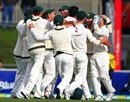 The Australian team crowds Mitchell Starc after he picked up the last wicket, Australia v Sri Lanka, 1st Test, Hobart, 5th day, December 18, 2012