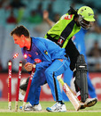 Johan Botha loses the ball in his attempt to run out Chris Gayle, Sydney Thunder v Adelaide Strikers, Big Bash League, December 20, 2012