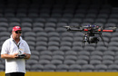 The crew member operates the coptercam, Melbourne Renegades v Brisbane Heat, Big Bash League, Docklands Stadium, Melbourne, December 22, 2012