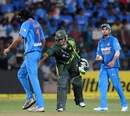 Ishant Sharma gets a friendly pat from Mohammad Hafeez, India v Pakistan, 1st T20, Bangalore, December 25, 2012