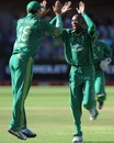 Aaron Phangiso gets high-fives from Faf du Plessis, South Africa v New Zealand, 3rd T20, Port Elizabeth, December 26, 2012