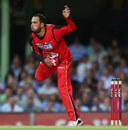 Fawad Ahmed bowls during his BBL debut, Sydney Sixers v Melbourne Renegades, BBL 2012-13, January 9, 2013
