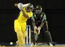 Krishmar Santokie drives during Jamaica's chase, Jamaica v Guyana, Caribbean T20, January 15, 2013