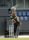 Christopher Barnwell drives during his 61, Guyana v Leeward Islands, Caribbean T20, January 17, 2013