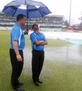 Umpires Adrian Holdstock and Shaun George take stock of the ground at Durban, South Africa v Pakistan, 1st T20I, Durban, March 1, 2013 