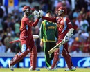 Denesh Ramdin and Kemar Roach celebrate a tense win, West Indies v Pakistan, Champions Trophy, Group B, The Oval, June 7, 2013