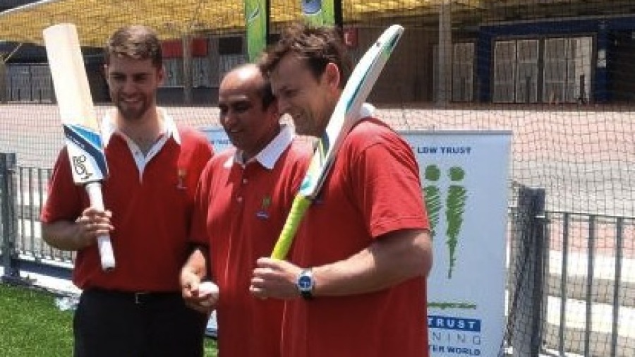 Sydney Thunder wicketkeeper Ryan Carters, LBW Trust chairman Darshak Mehta and former Test gloveman Adam Gilchrist Sydney Thunder wicketkeeper Ryan Carters, LBW Trust chairman Darshak Mehta and former Test gloveman Adam Gilchrist