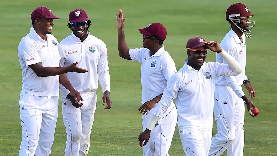 West Indies players celebrate the fall of a wicket West Indies players celebrate the fall of a wicket