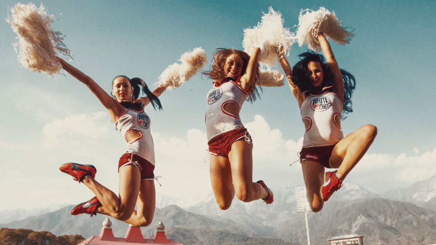 Cheerleaders perform during a break in play Cheerleaders perform during a break in play