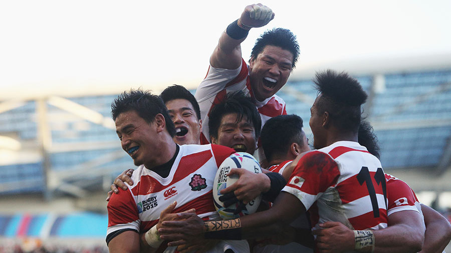 Japan's rugby team celebrate a stunning victory over South Africa Japan's rugby team celebrate a stunning victory over South Africa