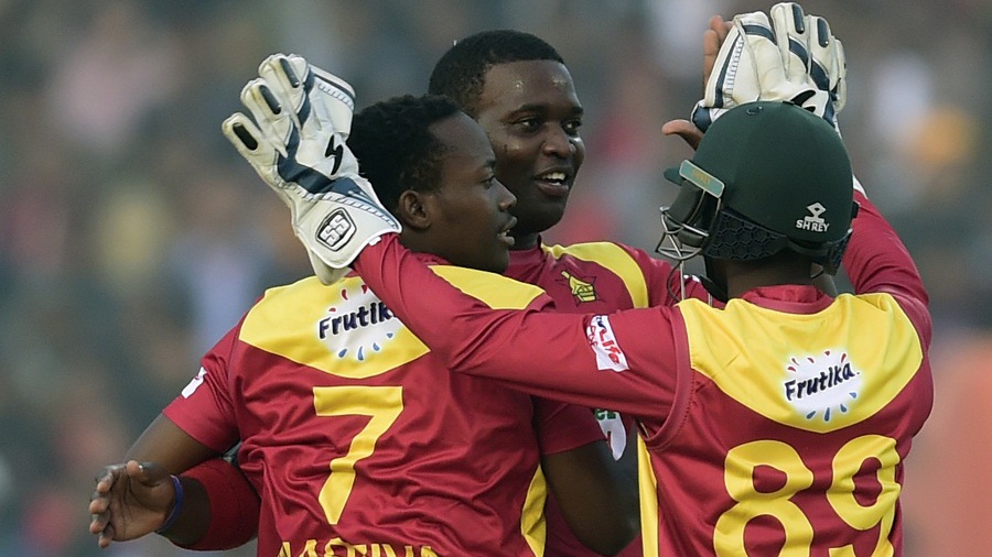 Tendai Chisoro and Neville Madziva celebrate a wicket Tendai Chisoro and Neville Madziva celebrate a wicket