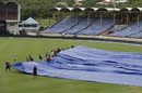 Steady rain kept the groundstaff busy on the third morning, West Indies v India, 3rd Test, Gros Islet, 3rd day, August 11, 2016 Steady rain kept the groundstaff busy on the third morning, West Indies v India, 3rd Test, Gros Islet, 3rd day, August 11, 2016
