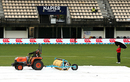 Ground staff tend to the covers following a spell of rain before the match, New Zealand v Australia, 2nd ODI, Napier, February 2, 2017 Ground staff tend to the covers following a spell of rain before the match, New Zealand v Australia, 2nd ODI, Napier, February 2, 2017