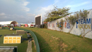 Corrugated iron sheets and SLC branding obscuring the view into the ground from the road, Galle, July 25, 2017 Corrugated iron sheets and SLC branding obscuring the view into the ground from the road, Galle, July 25, 2017