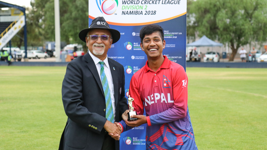 Sandeep Lamichhane receives his Man of the Match award from ICC match referee Dev Govindjee Sandeep Lamichhane receives his Man of the Match award from ICC match referee Dev Govindjee