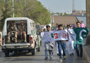 Fans walk past the rangers march around the National Stadium ahead of the start of play, Pakistan v West Indies, 1st T20I, Karachi, April 1, 2018 Fans walk past the rangers march around the National Stadium ahead of the start of play, Pakistan v West Indies, 1st T20I, Karachi, April 1, 2018