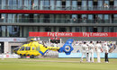 Play was interrupted when an Air Ambulance helicopter had to land on the outfield, Lancashire v Essex, County Championship, Division One, Old Trafford, June 11, 2018 Play was interrupted when an Air Ambulance helicopter had to land on the outfield, Lancashire v Essex, County Championship, Division One, Old Trafford, June 11, 2018