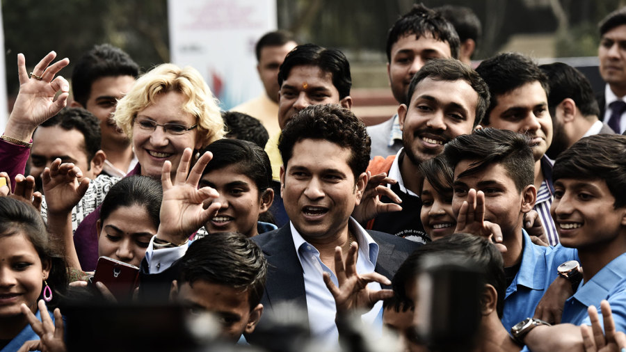 Sachin Tendulkar poses for a photo with children Sachin Tendulkar poses for a photo with children