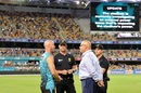 Chris Lynn and match officials have a chat after a power blackout forced the BBL game to be abandoned, Brisbane Heat v Sydney Thunder, BBL 2018-19, Brisbane