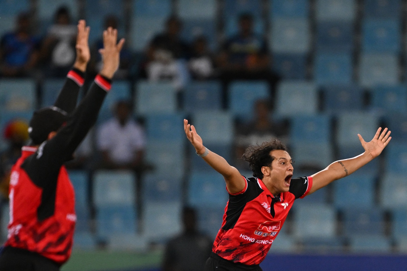 Shukla leads Oman demolition as Hong Kong get their first points