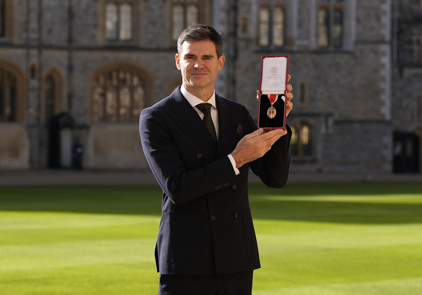 James Anderson receives knighthood in Windsor Castle ceremony
