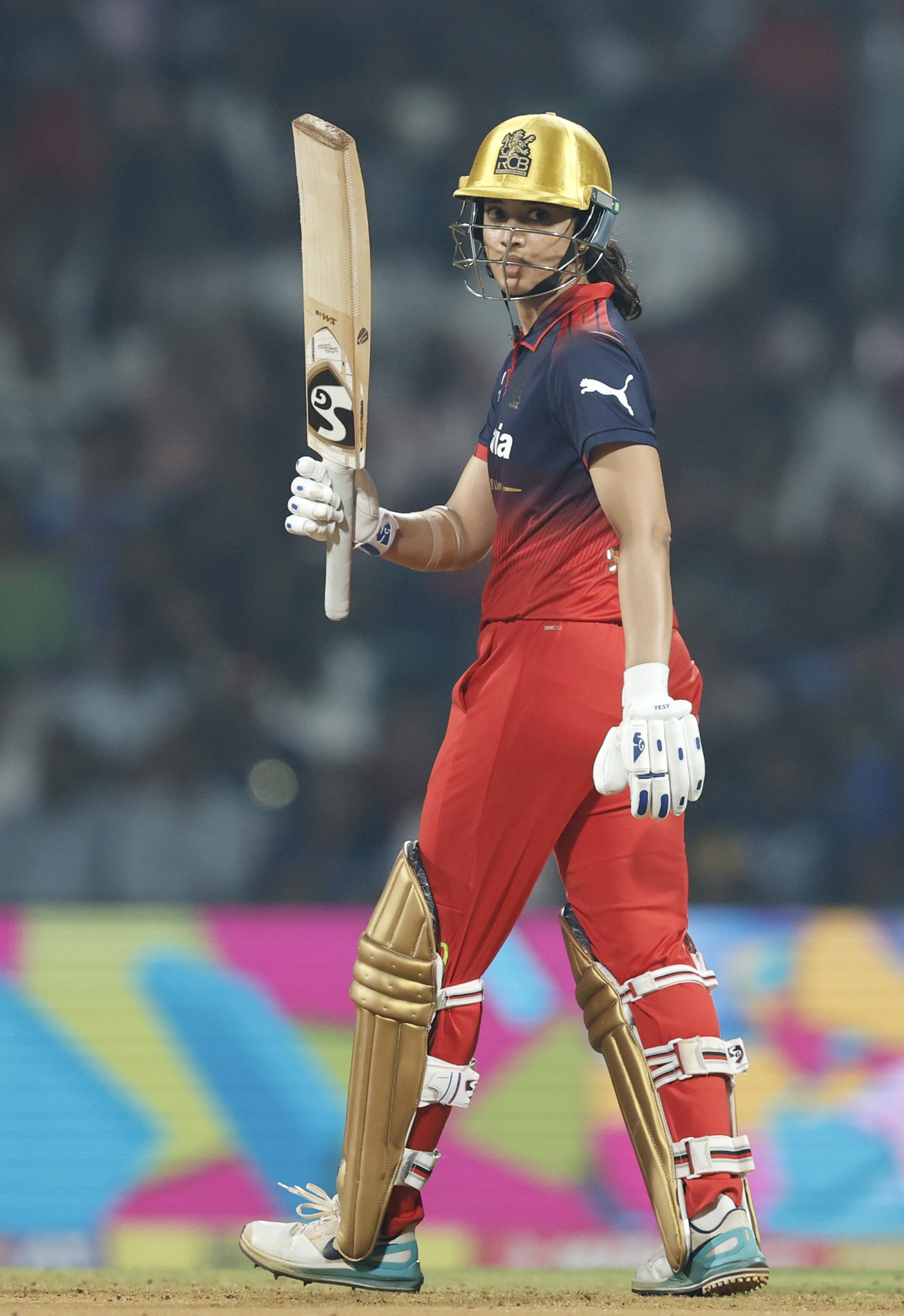 Mandhana, Voll, bowlers make it four in four for RCB