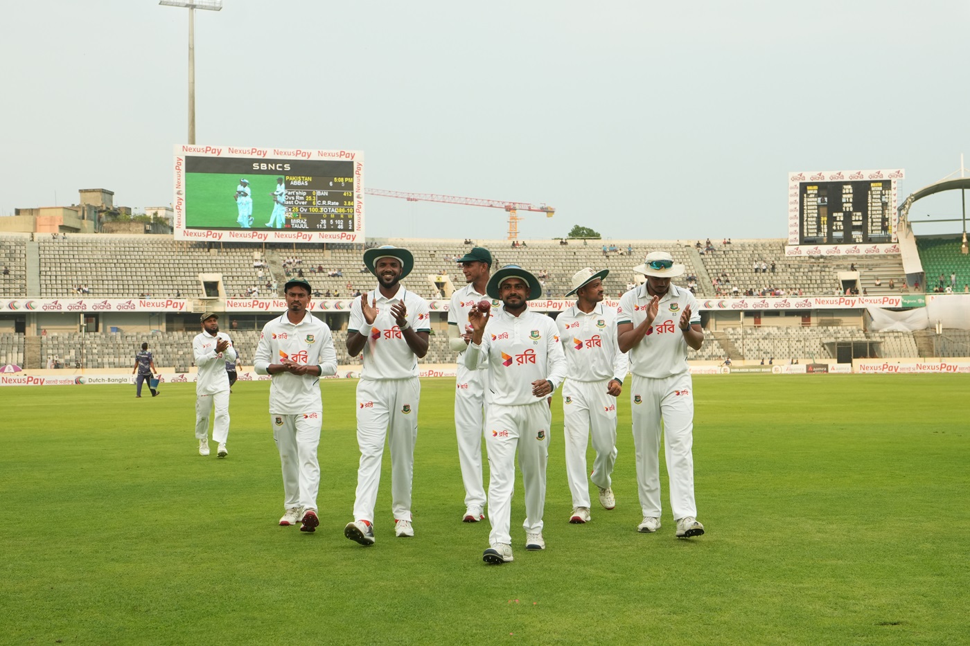 Mehidy five-for hands Bangladesh slim lead after Agha, Rizwan fight back