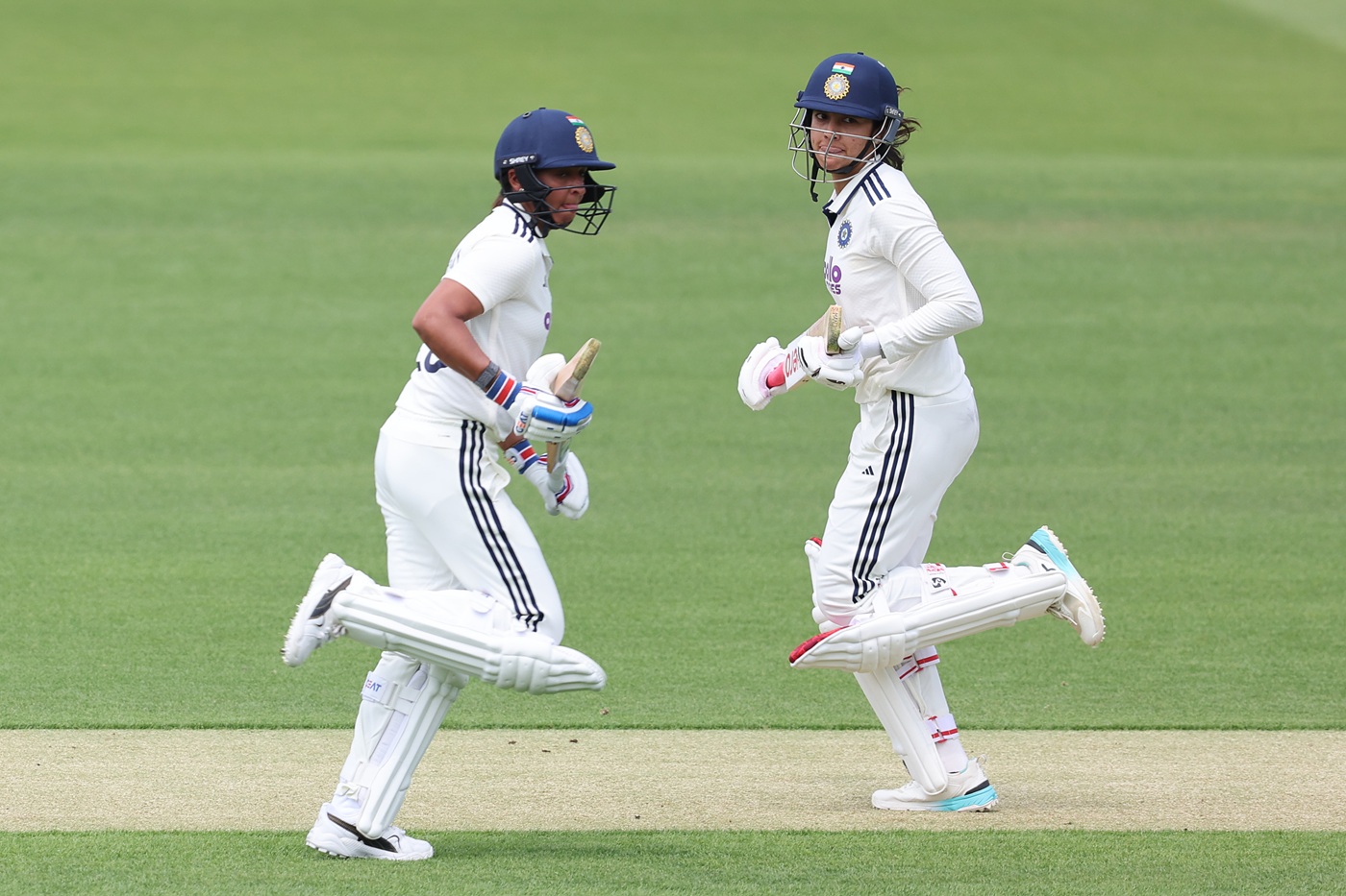 Mandhana, Harmanpreet fifties but England restrict India to 285 on historic opening day