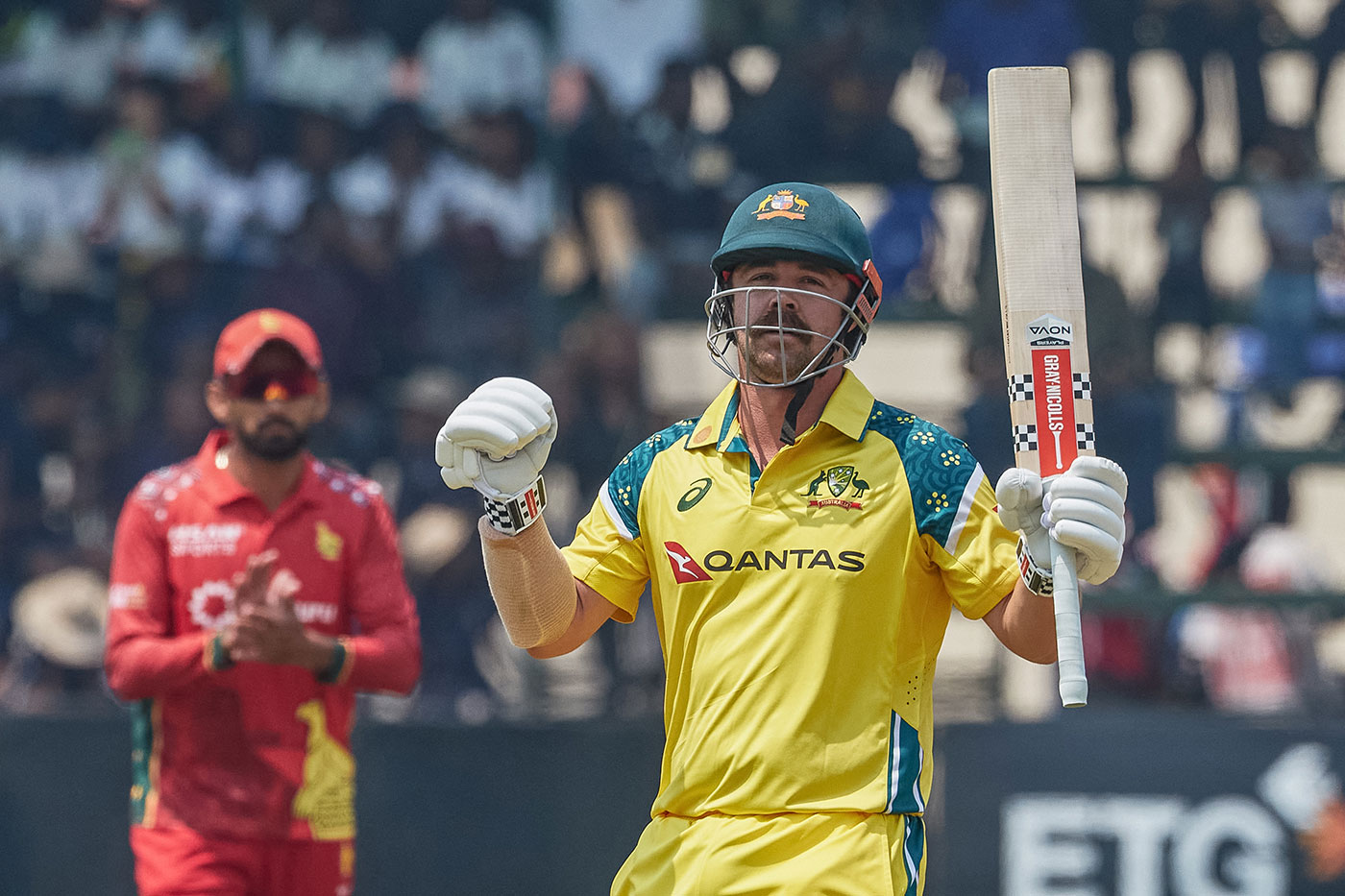 Head's 75-ball hundred sets up huge Australia total