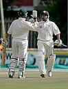 JP Duminy and Ashwell Prince celebrate South Africa A's victory over England XI, Potchefstroom, December 13, 2004