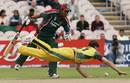 Brad Hogg dives to save runs during his tight spell of bowling, Australia v Bangladesh, NatWest Series, Old Trafford, June 25