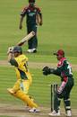 Adam Gilchrist cuts as Khaled Mashud watches, Australia v Bangladesh, NatWest Series, Old Trafford, June 25