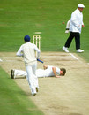 David Gower runs past a flattened Craig McDermott, on way to his innings of 215, England v Australia, Edgbaston, 1985