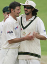 Michael Kasprowicz and Jason Gillespie celebrate a Worcestershire wicket, Worcestershire v Australia, Worcester, August 1, 2005